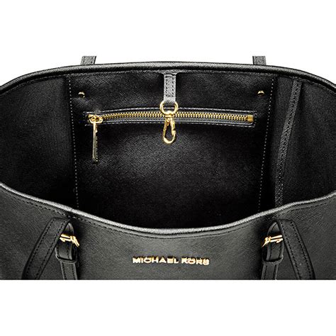 michael kors jet set travel black tote|Michael Kors airplane print.